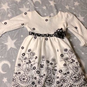 Off white floral dress with black flower design